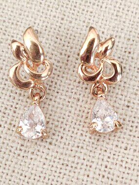 Elegant gold and faux diamond drop earrings